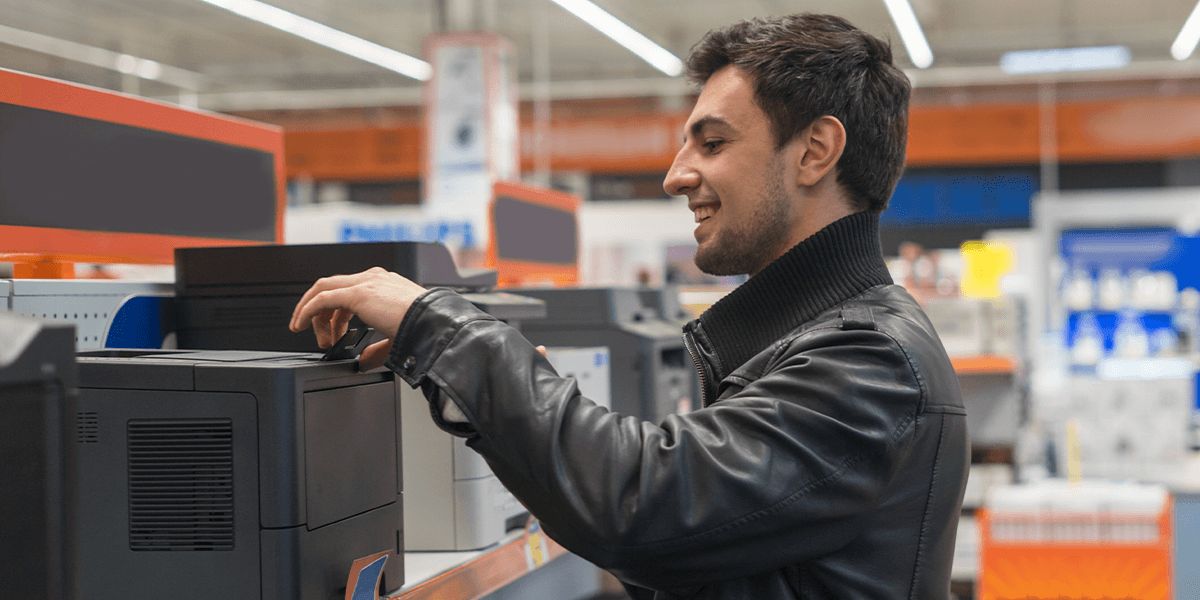 customer choosing Printer in supermarket shop